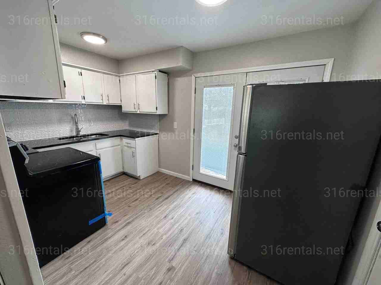 1121 E 61st St N - Photo 7 of 12