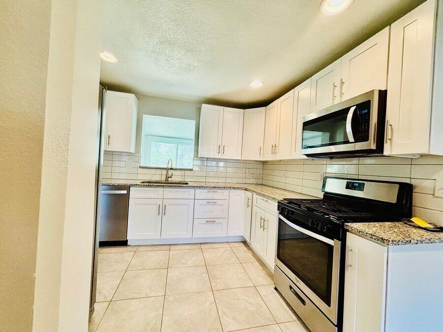 10085 W 23rd Ave - Photo 5 of 16