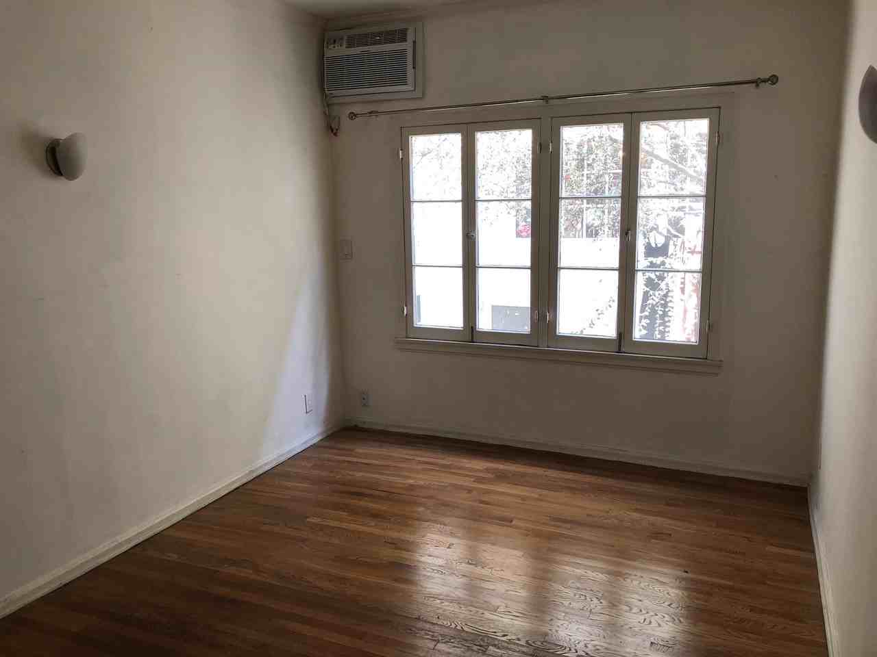 Reeves Apartments - Photo 3 of 15