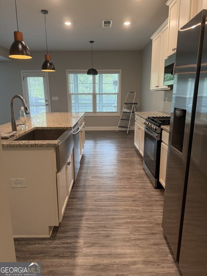 1120 Riverwalk Manor Dr - Photo 5 of 27