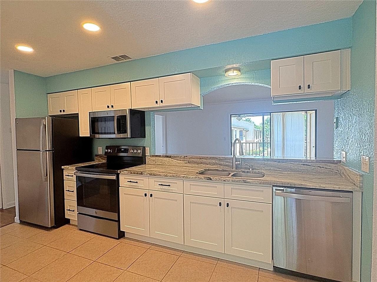 12261 Sailwinds Dr #203 - Photo 3 of 35