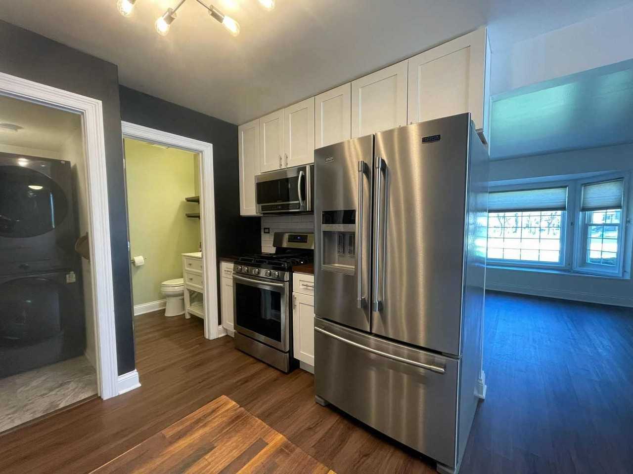 211 E Oneida Ave Unit G - Photo 7 of 17