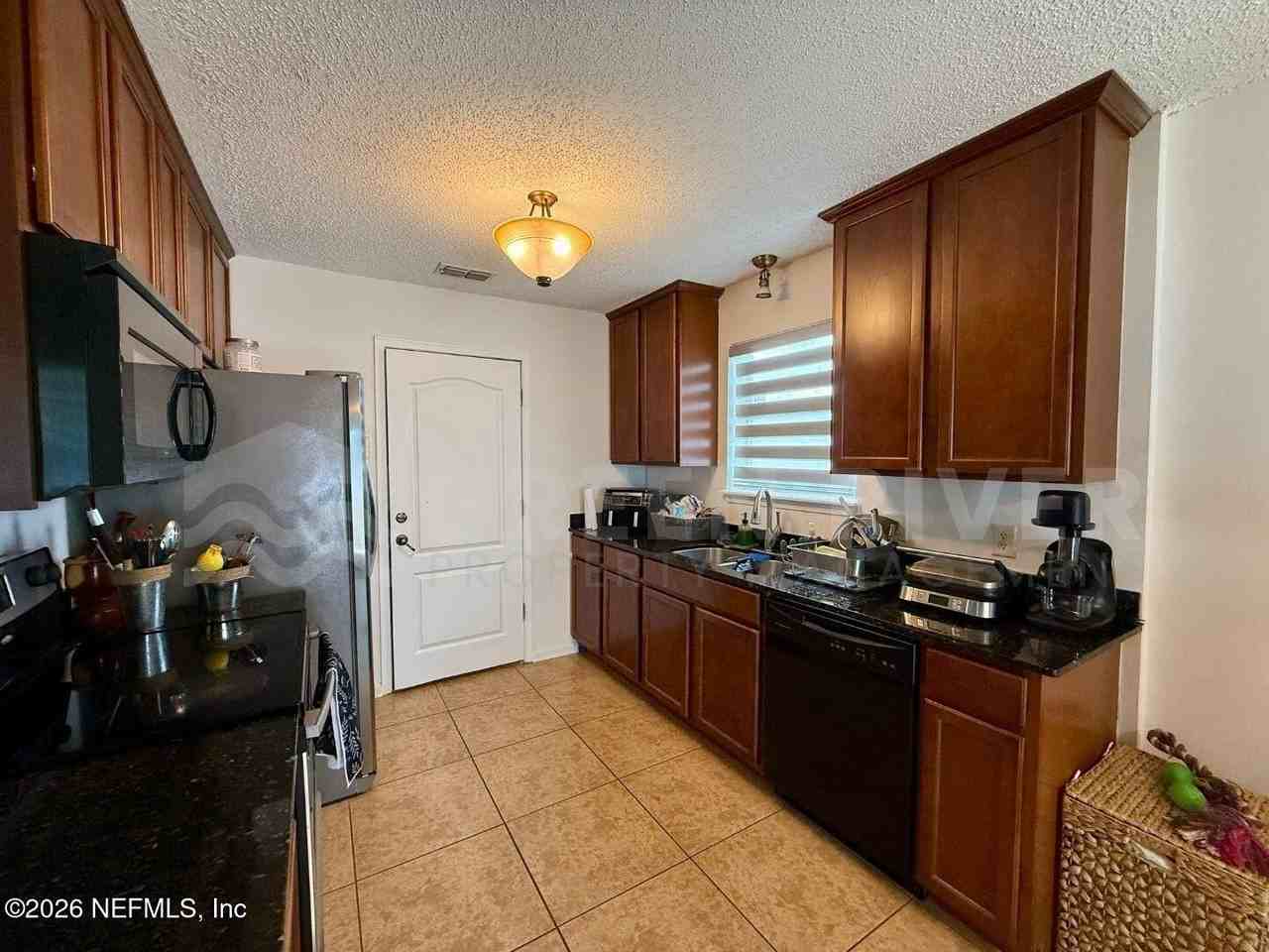 7541 Allspice Cir N - Photo 6 of 39