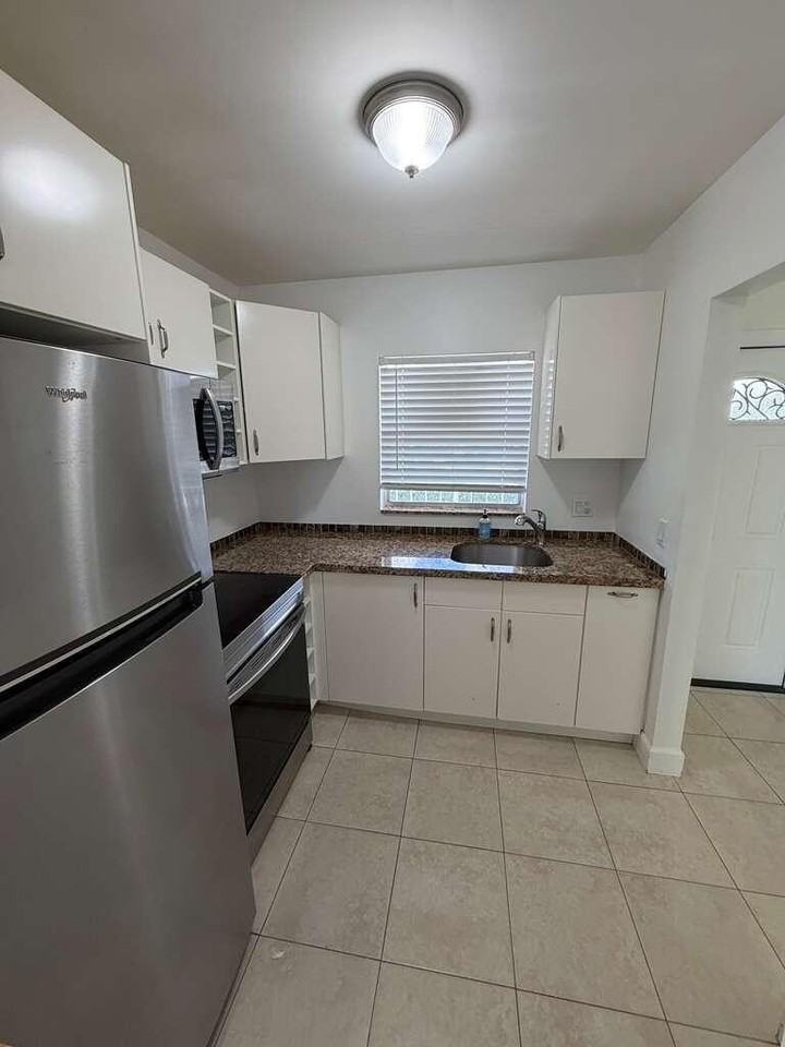 9851 Sandalfoot Blvd #220 - Photo 2 of 19