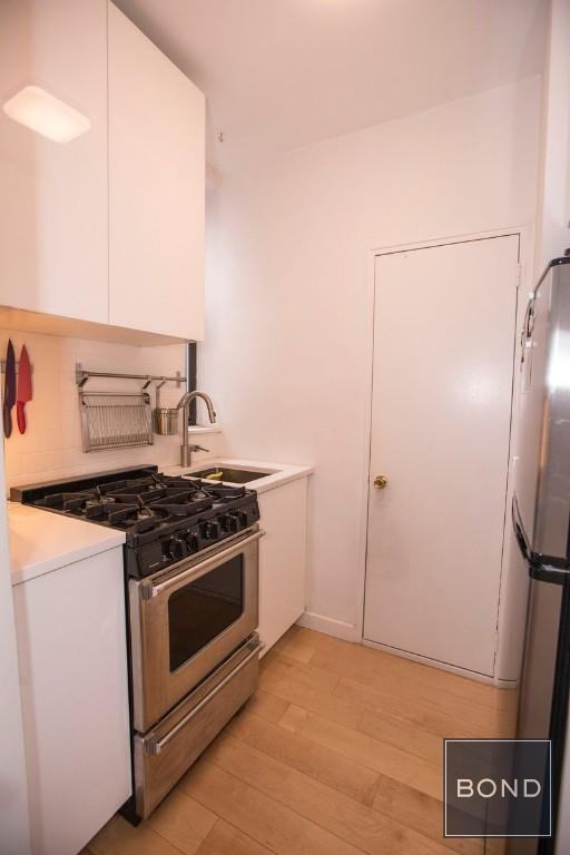 110 Thompson St - Photo 3 of 9