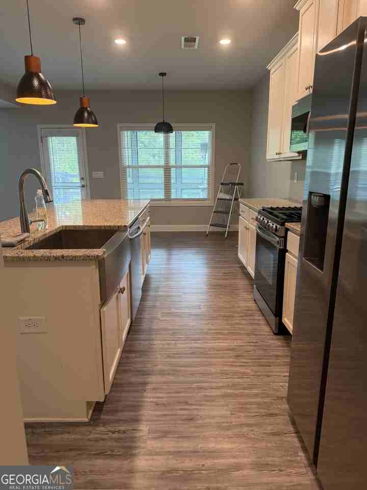 1120 Riverwalk Manor Dr - Photo 5 of 27