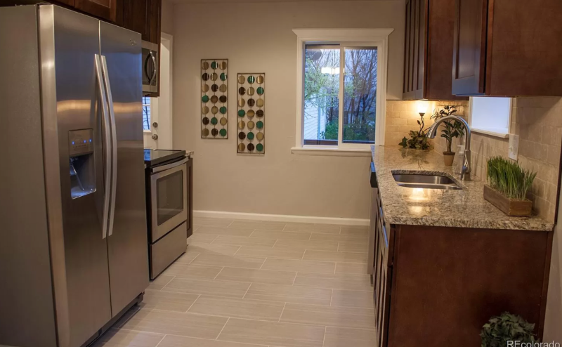 7739 Raleigh St - Photo 3 of 17