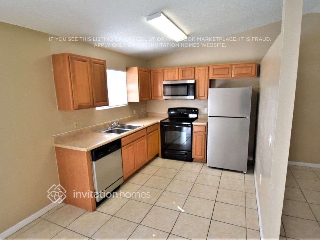 7509 N Saint Peter Ave - Photo 6 of 14