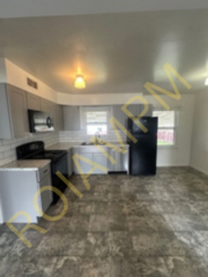 1555 Heyburn Ave E - Photo 3 of 9