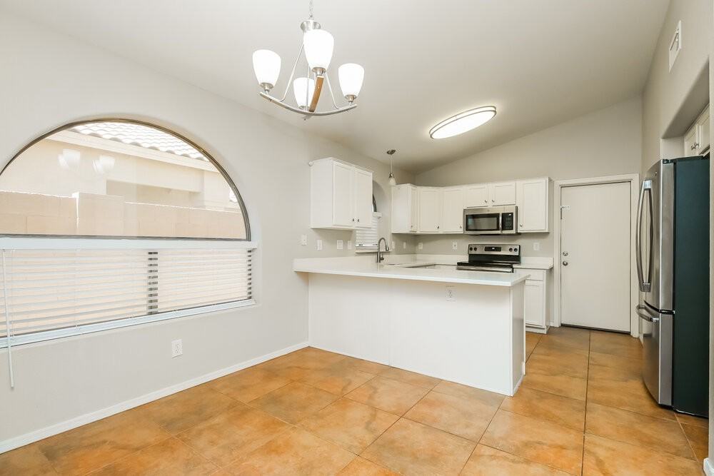 9909 E Onza Ave - Photo 7 of 16