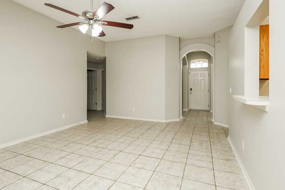 7811 Invermere Blvd N - Photo 4 of 16