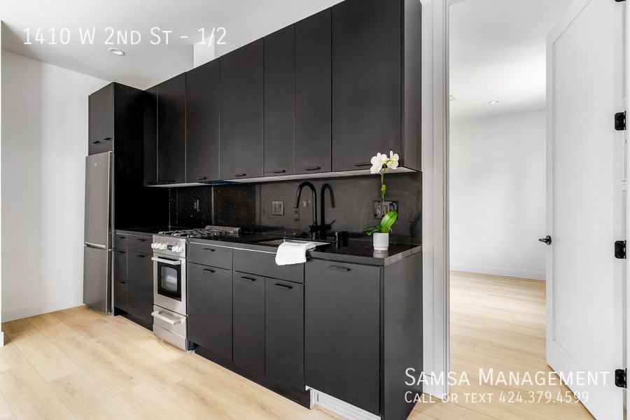 1410 W 2nd St #1-2 - Photo 2 of 10