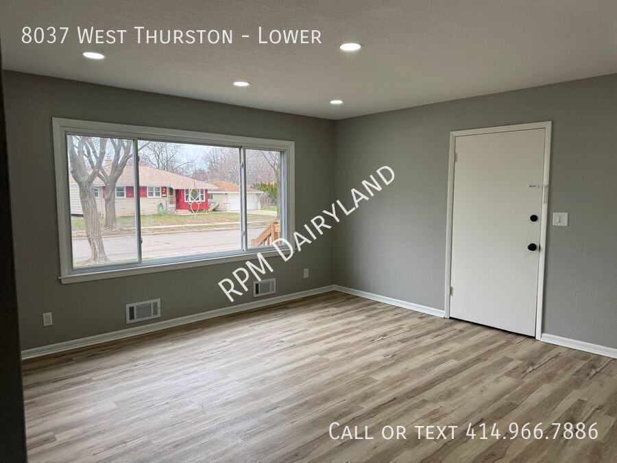 8037 W Thurston Ave - Photo 3 of 18