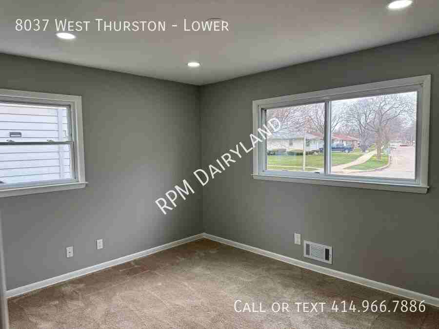 8037 W Thurston Ave - Photo 4 of 18