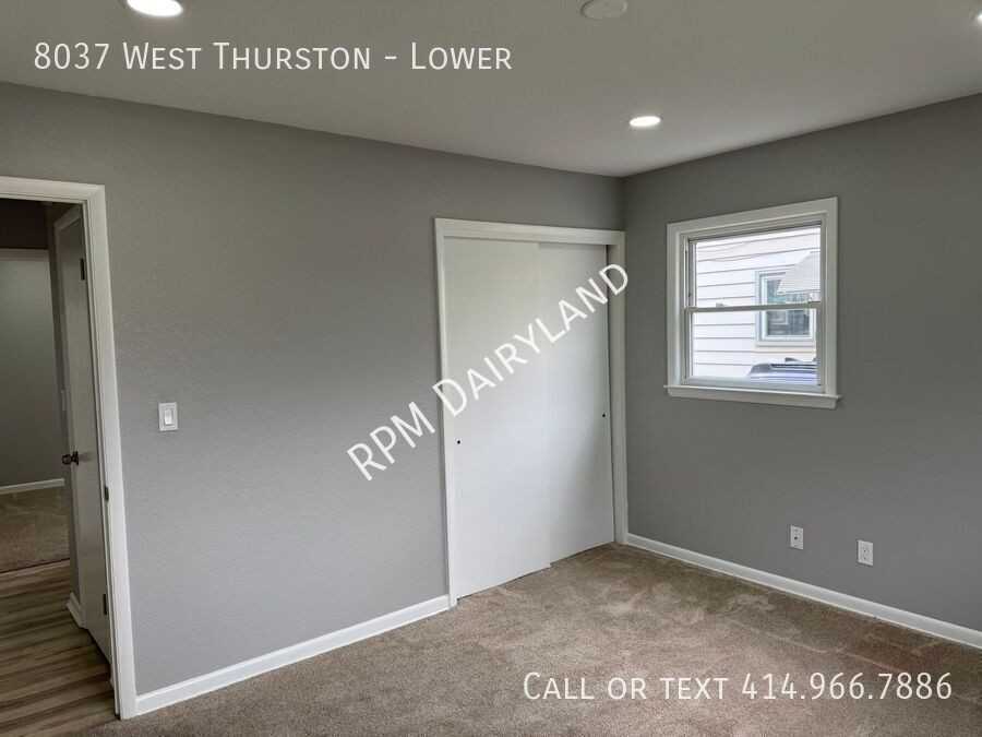 8037 W Thurston Ave - Photo 5 of 18