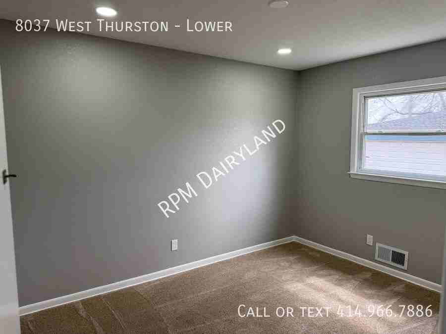 8037 W Thurston Ave - Photo 6 of 18