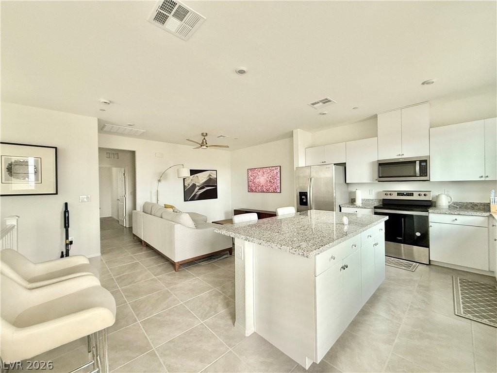 5672 Beguiling Falls St - Photo 7 of 34