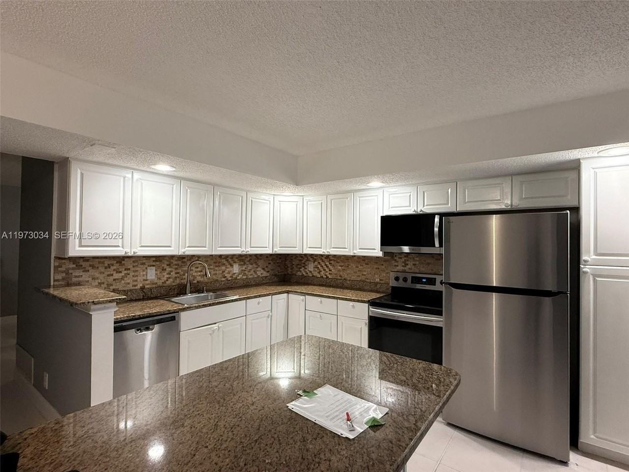 5220 Las Verdes Cir #114 - Photo 6 of 24