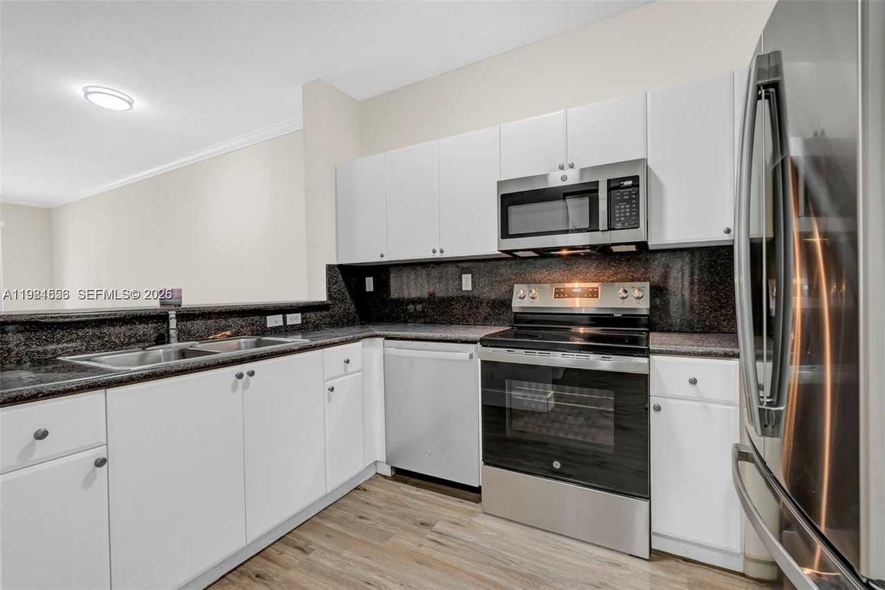 7250 Nw 177th St #102-16 - Photo 6 of 16