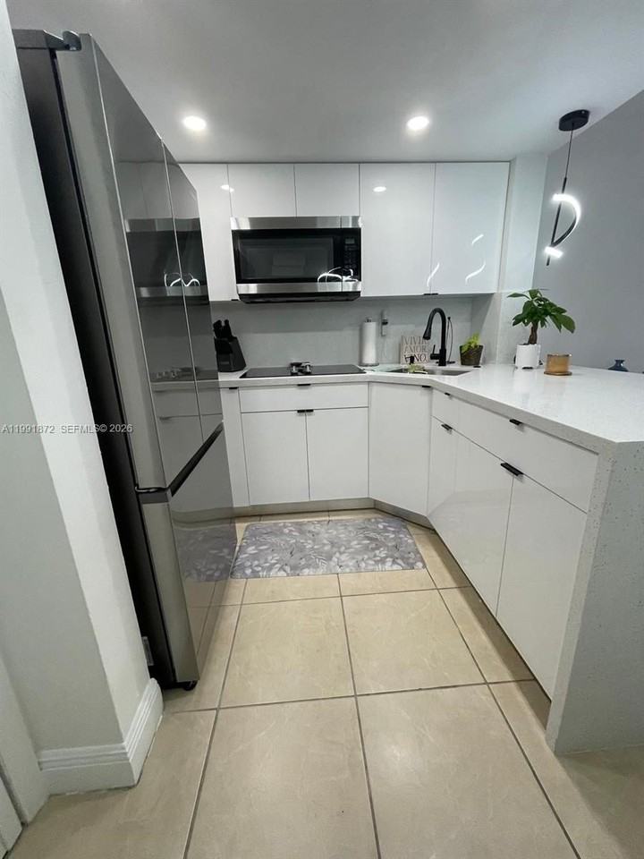 8675 Nw 5th Ter #13-204 - Photo 2 of 21