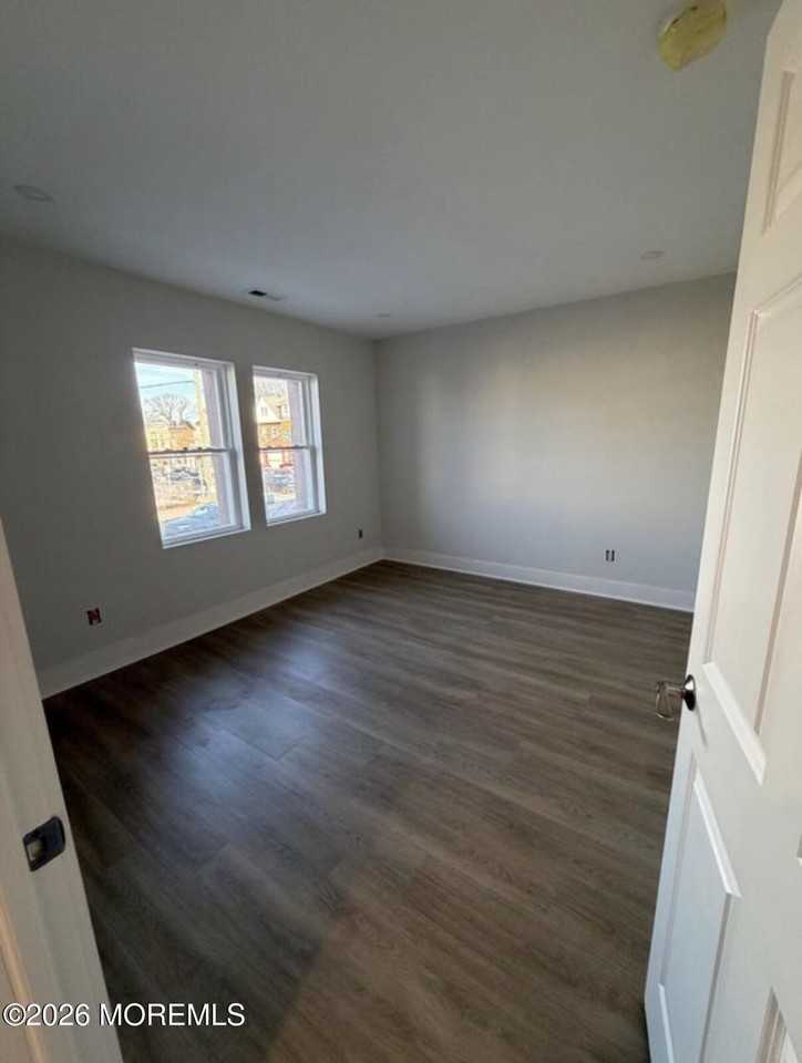 808 Asbury Ave Apt 1 - Photo 5 of 9