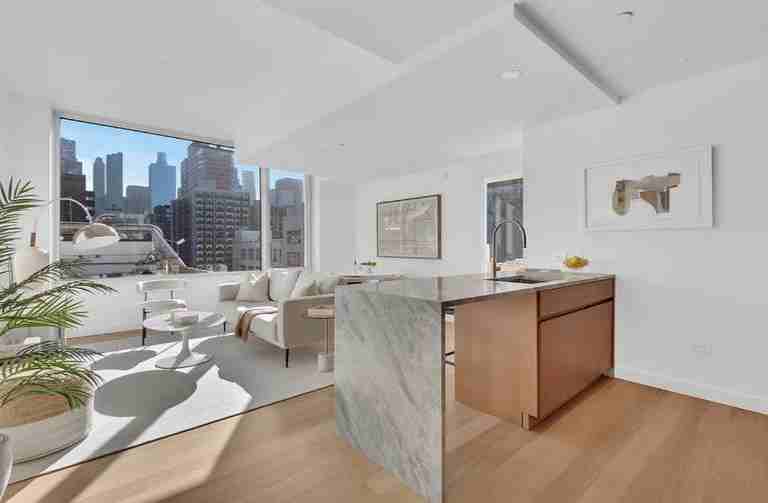 611 W 56th St - Photo 2 of 5