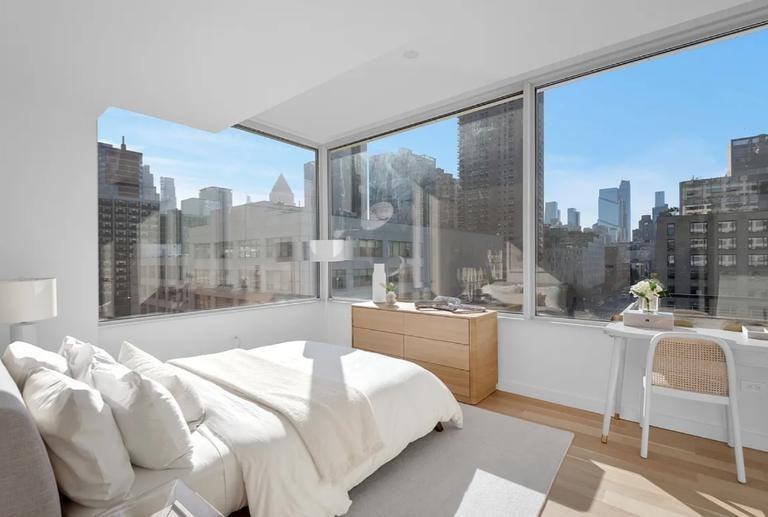 611 W 56th St - Photo 4 of 5