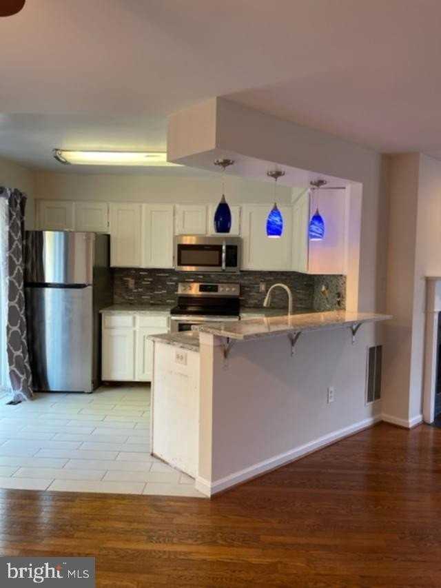 216 Pinecove Ave - Photo 5 of 17