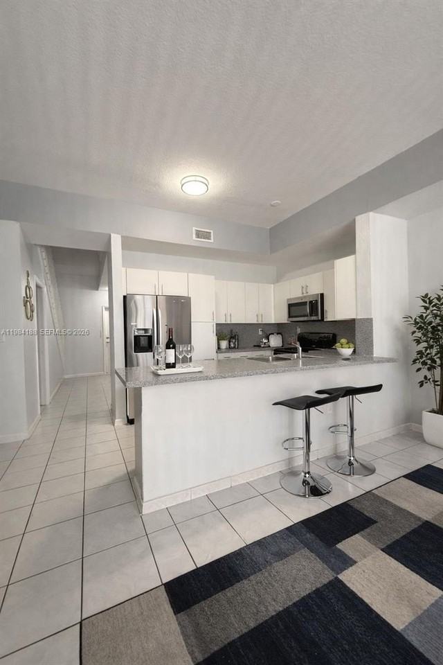 10909 Nw 43rd Ln - Photo 4 of 18