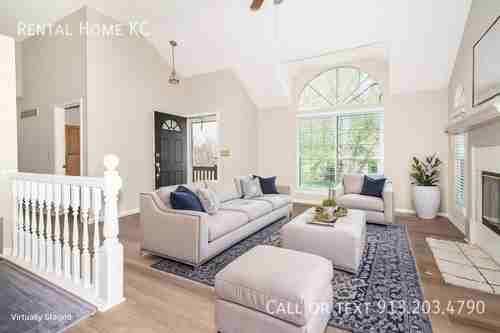 7413 W 154th Ter - Photo 2 of 31