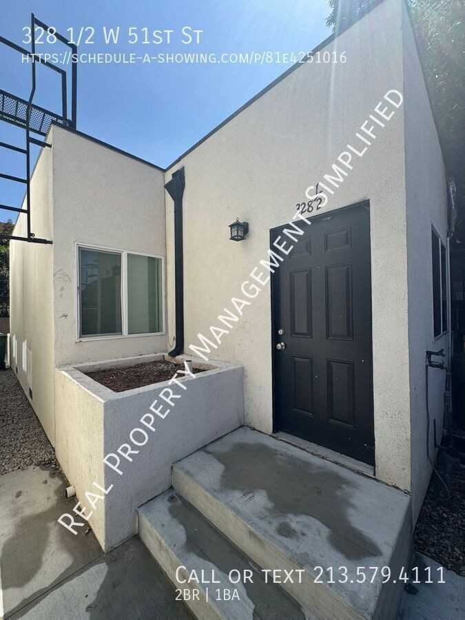 328 1/2 W 51st St - Photo 5 of 6