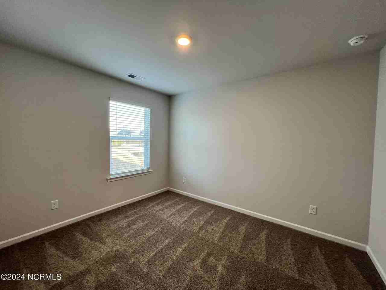 8219 E Highcroft Dr Ne - Photo 6 of 23