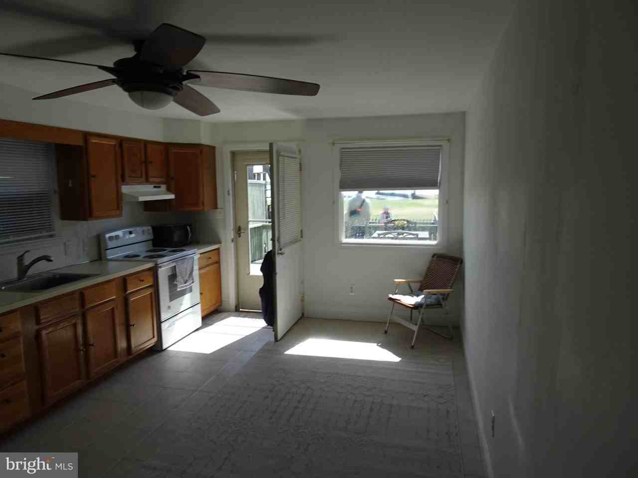 213 E 2nd St - Photo 5 of 15