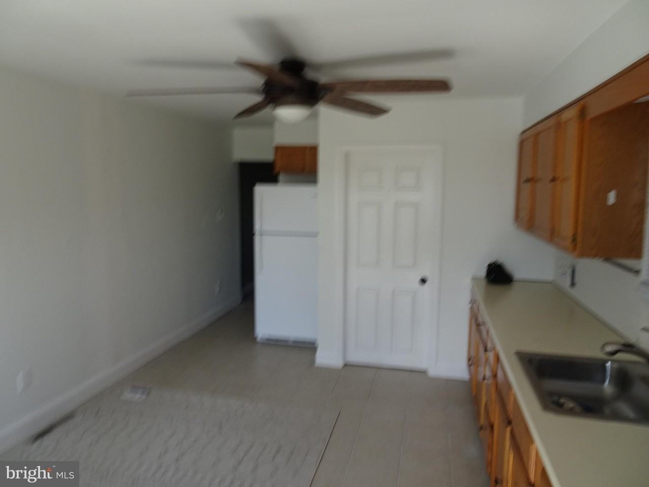 213 E 2nd St - Photo 6 of 15