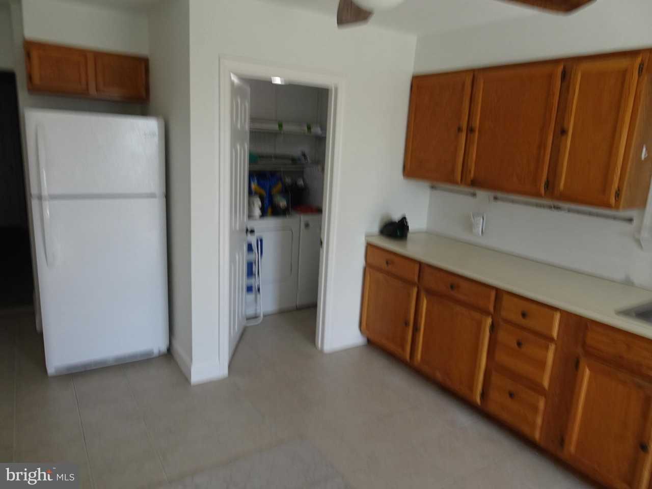 213 E 2nd St - Photo 7 of 15