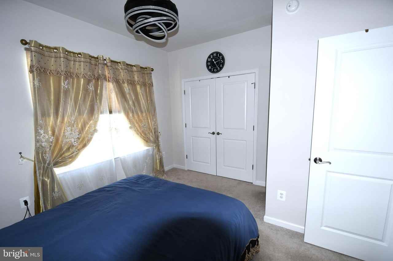 5937 NORTHWEST Drive unit: (Master Bedroom) - Photo 5 of 10