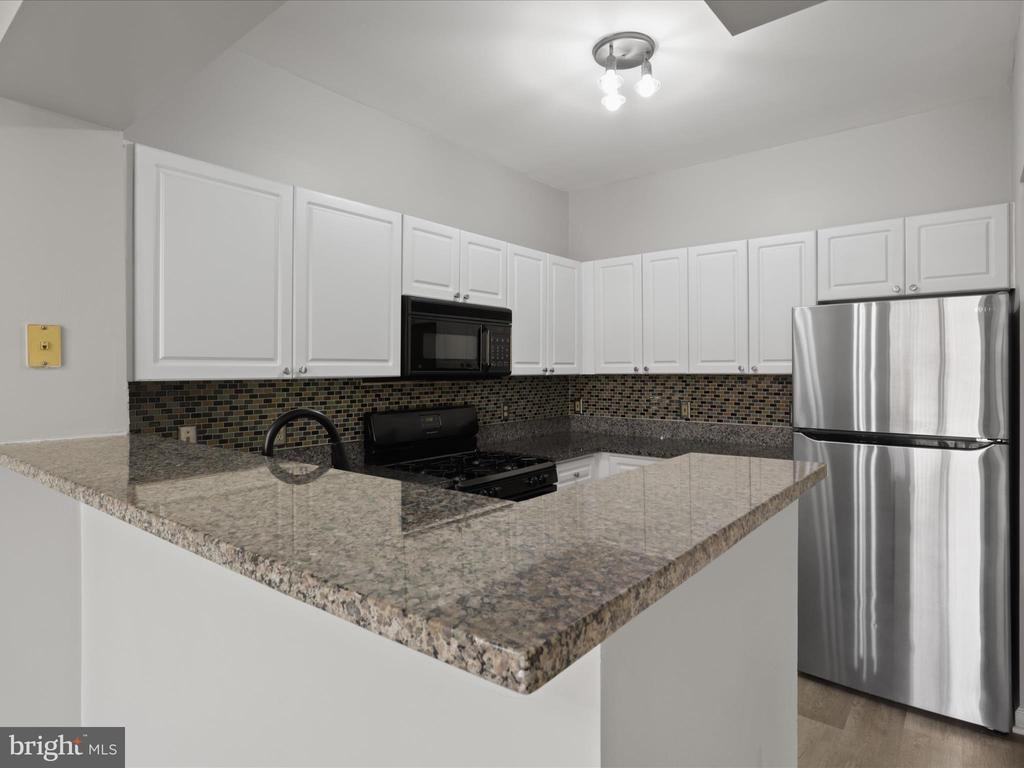 12909 Alton Sq ##303 - Photo 2 of 31