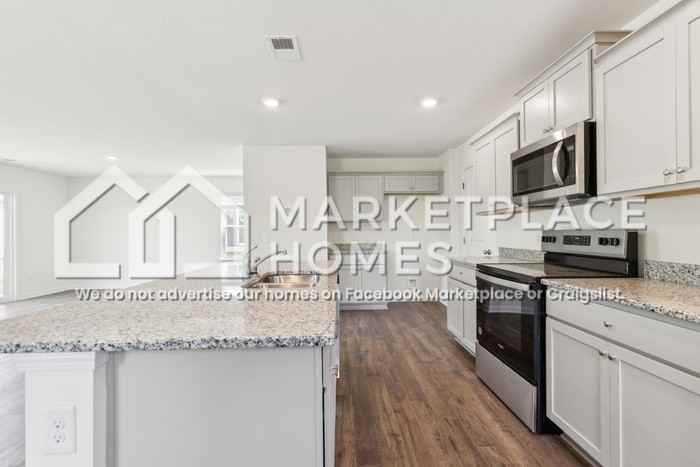 702 Newtons Way - Photo 6 of 34