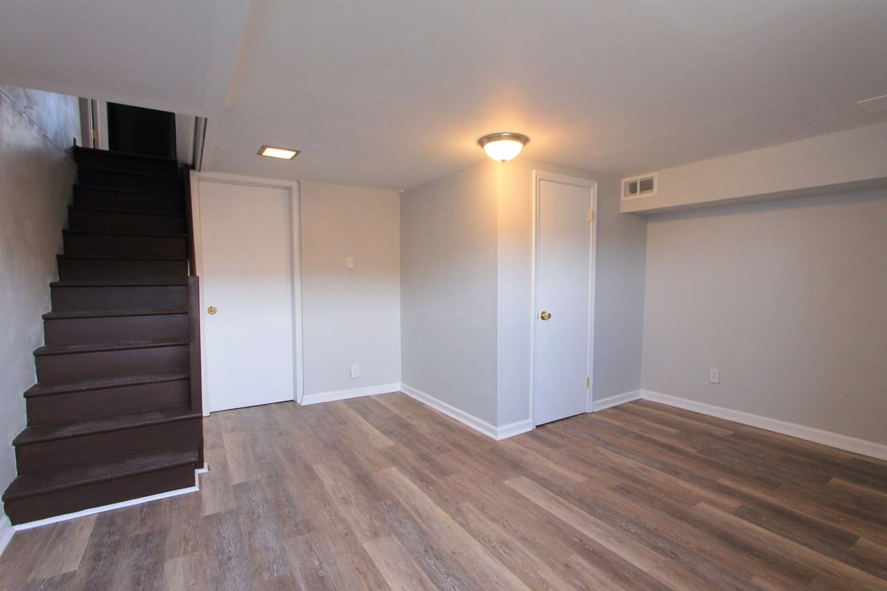 8613 Gilbert St - Photo 4 of 28