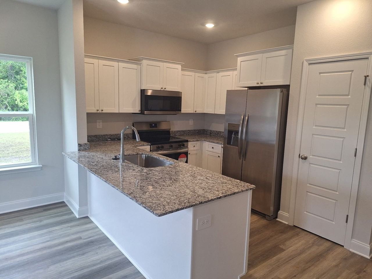 The Island Townhomes, LLC - Photo 3 of 11