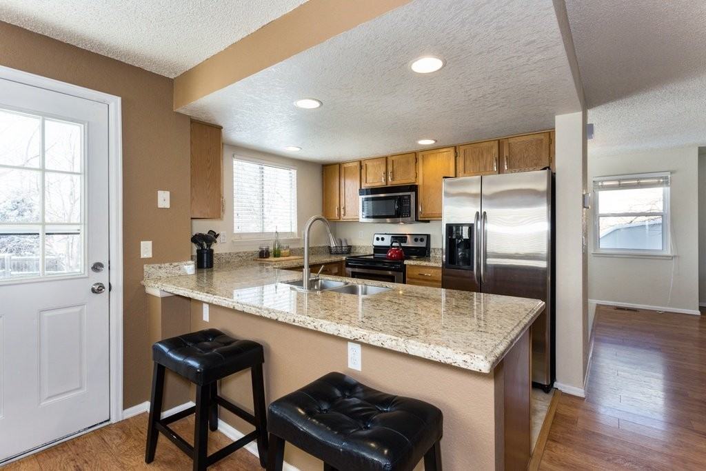 4955 S Flanders Ct - Photo 6 of 17