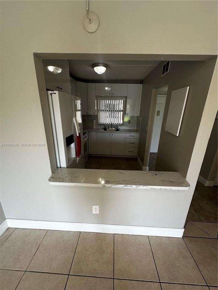 6565 W 26th Dr #103-34 - Photo 2 of 15