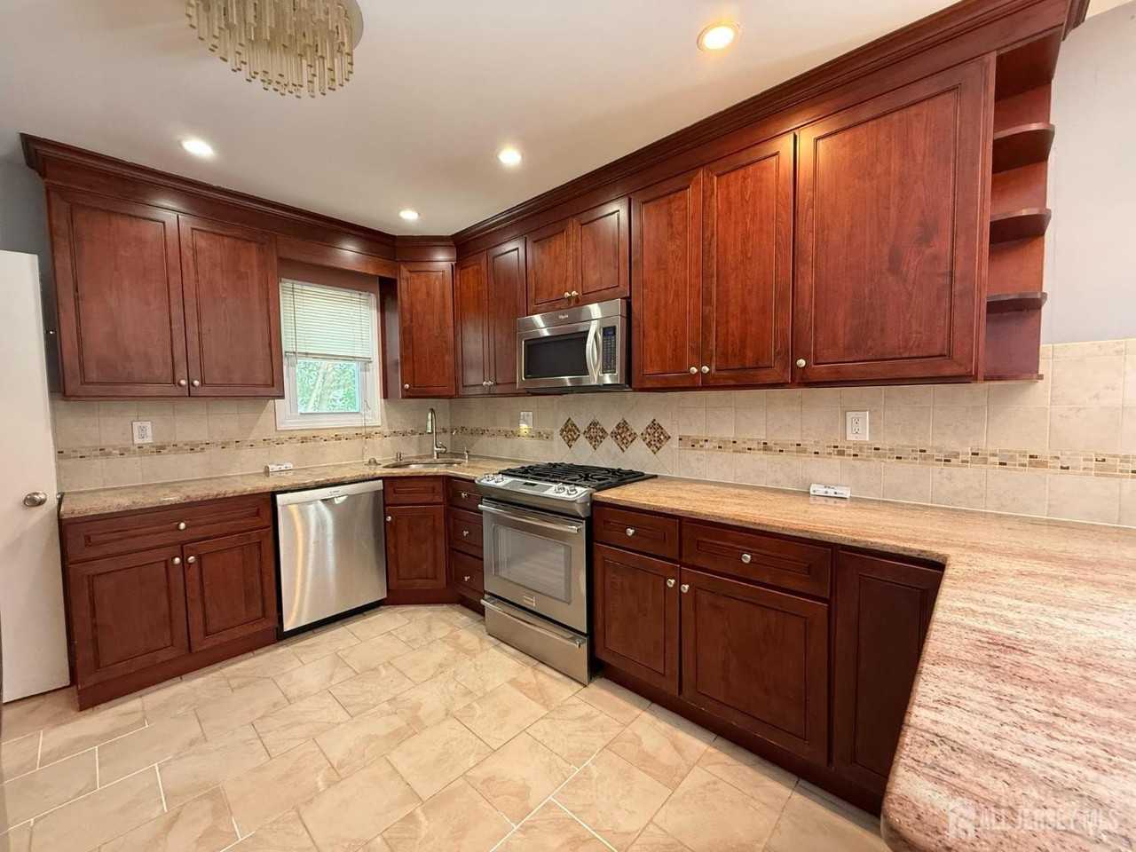 869 Gates Ave - Photo 2 of 27