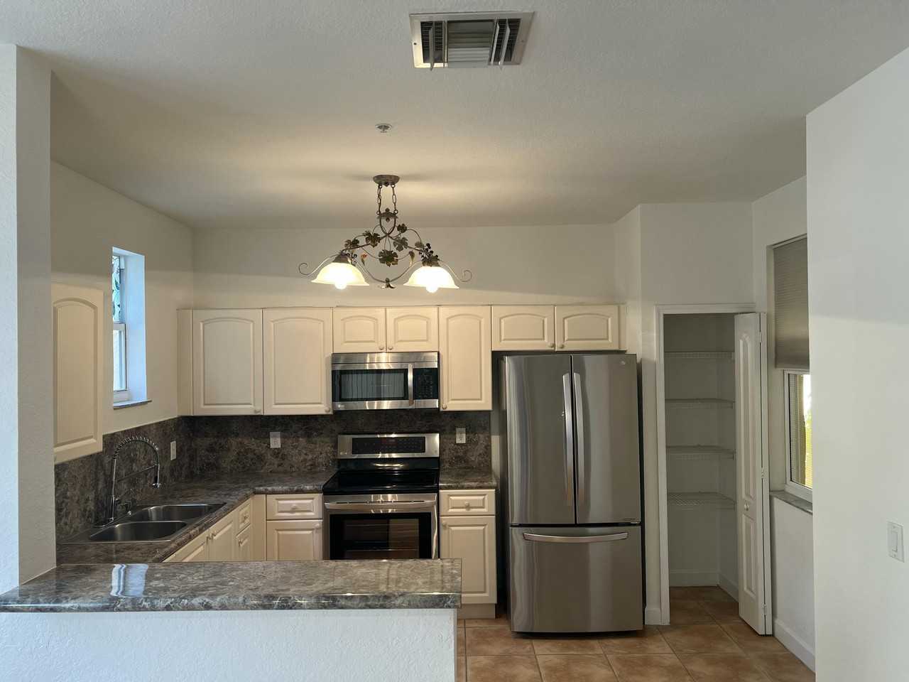 150 Jacaranda Country Club Dr Apt 102 - Photo 2 of 28