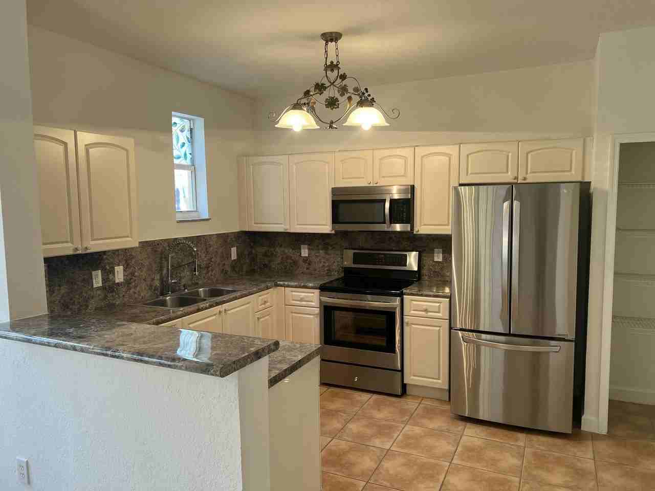 150 Jacaranda Country Club Dr Apt 102 - Photo 3 of 28