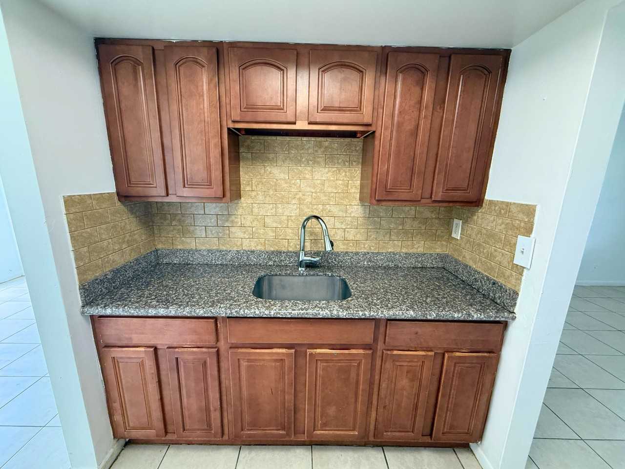 4100 NW 16TH AVE - Photo 5 of 50