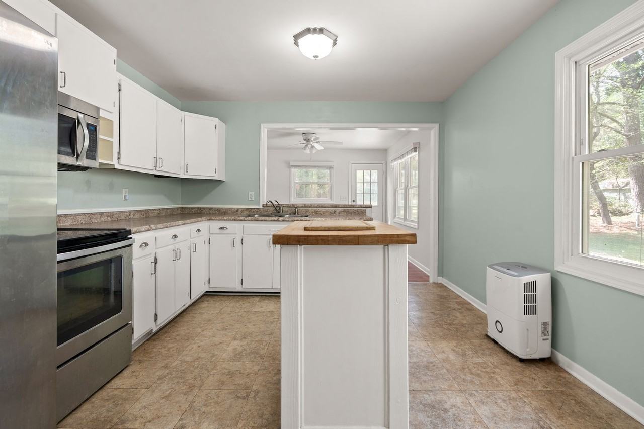 8907 Rollingwood Rd - Photo 2 of 25