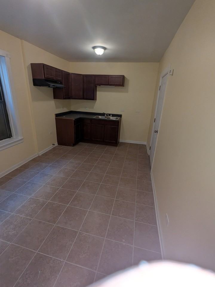 1315 W 82nd St - Photo 2 of 5