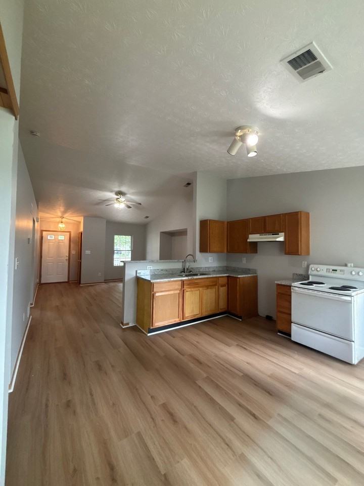 6711 Hunters Creek Blvd #1 - Photo 3 of 16