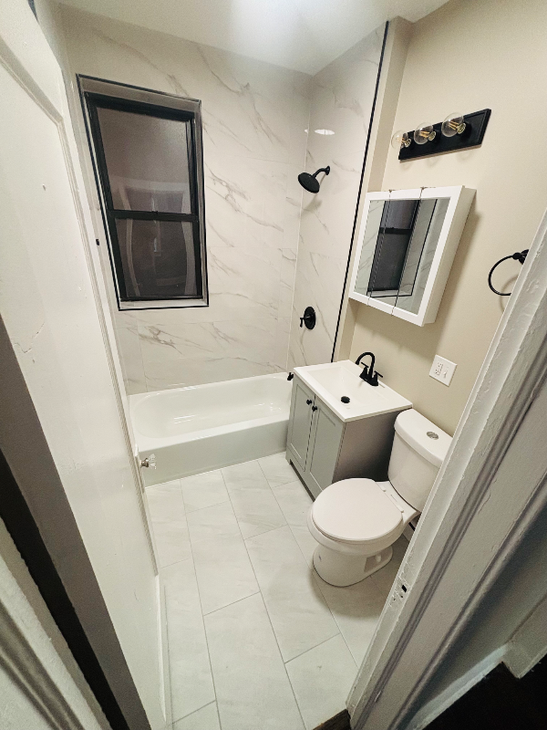 704 E 80th St #1 - Photo 4 of 7